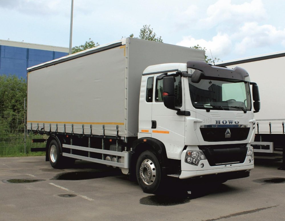 Автомобиль бортовой с тентом Howo T5G 4x2, 280 л.с. с АКПП .